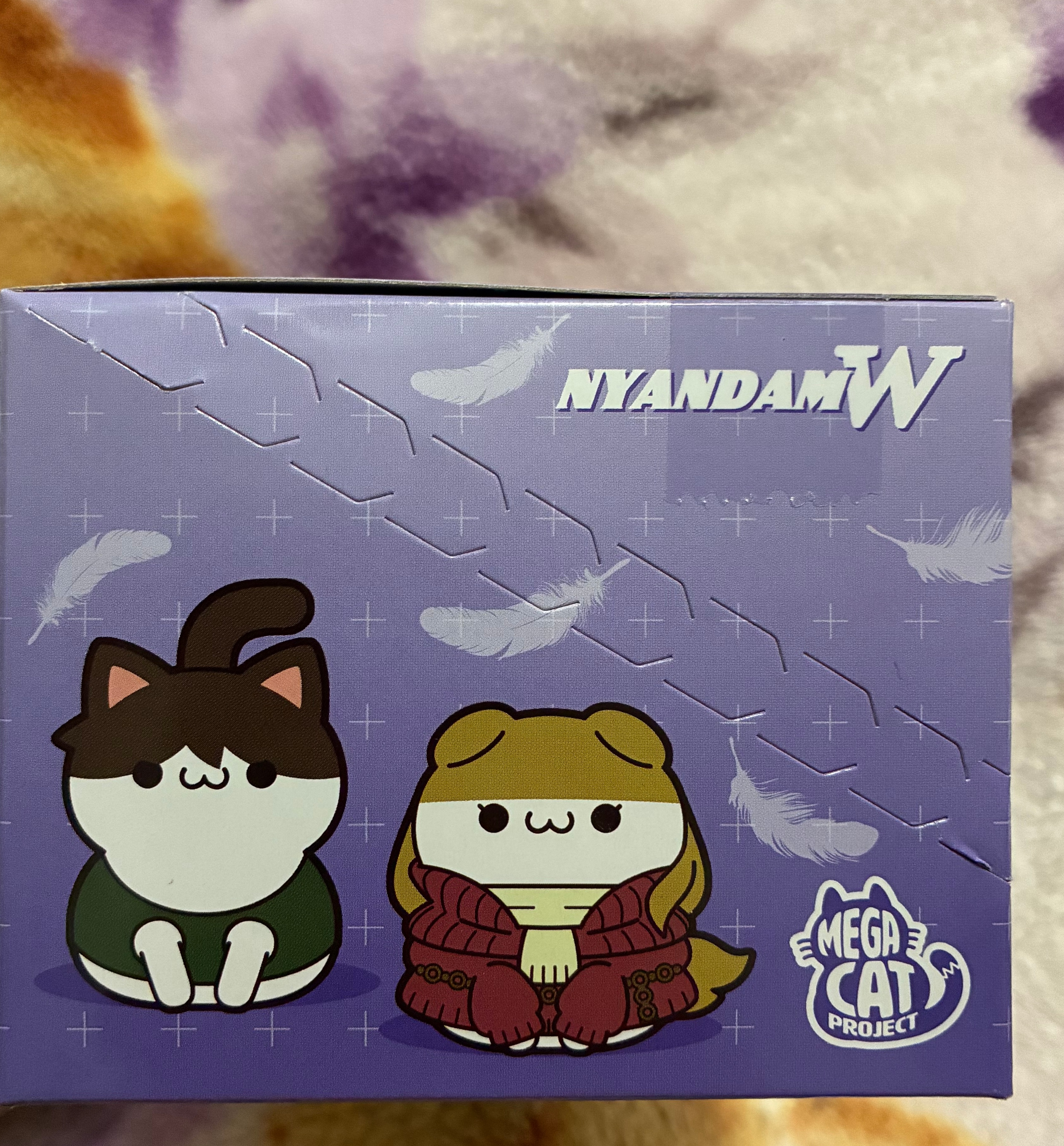 Side box of Gundam wing cats showing Heero and Relena cat forms.